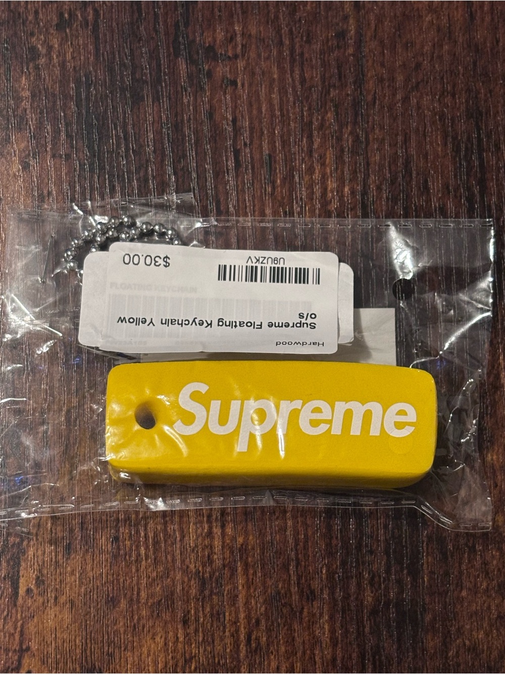 Supreme Yellow Floating Keychain with White Logo